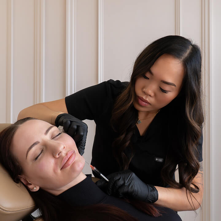 Jillian Schenk injecting client at the symm label in Calgary