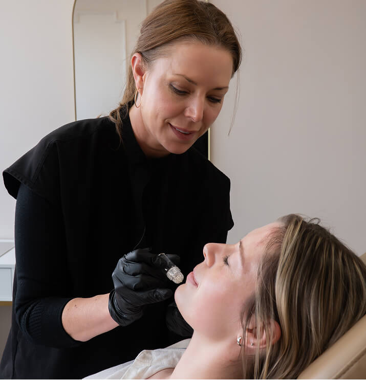 Practitioner performing VAMP PDRN treatment on client at the symm label in Calgary