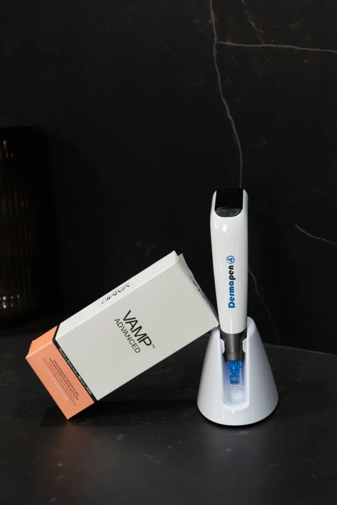 VAMP brand product box and microneedling device against acne scars